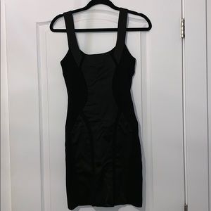 Bedo black bodycon dress with silk details.